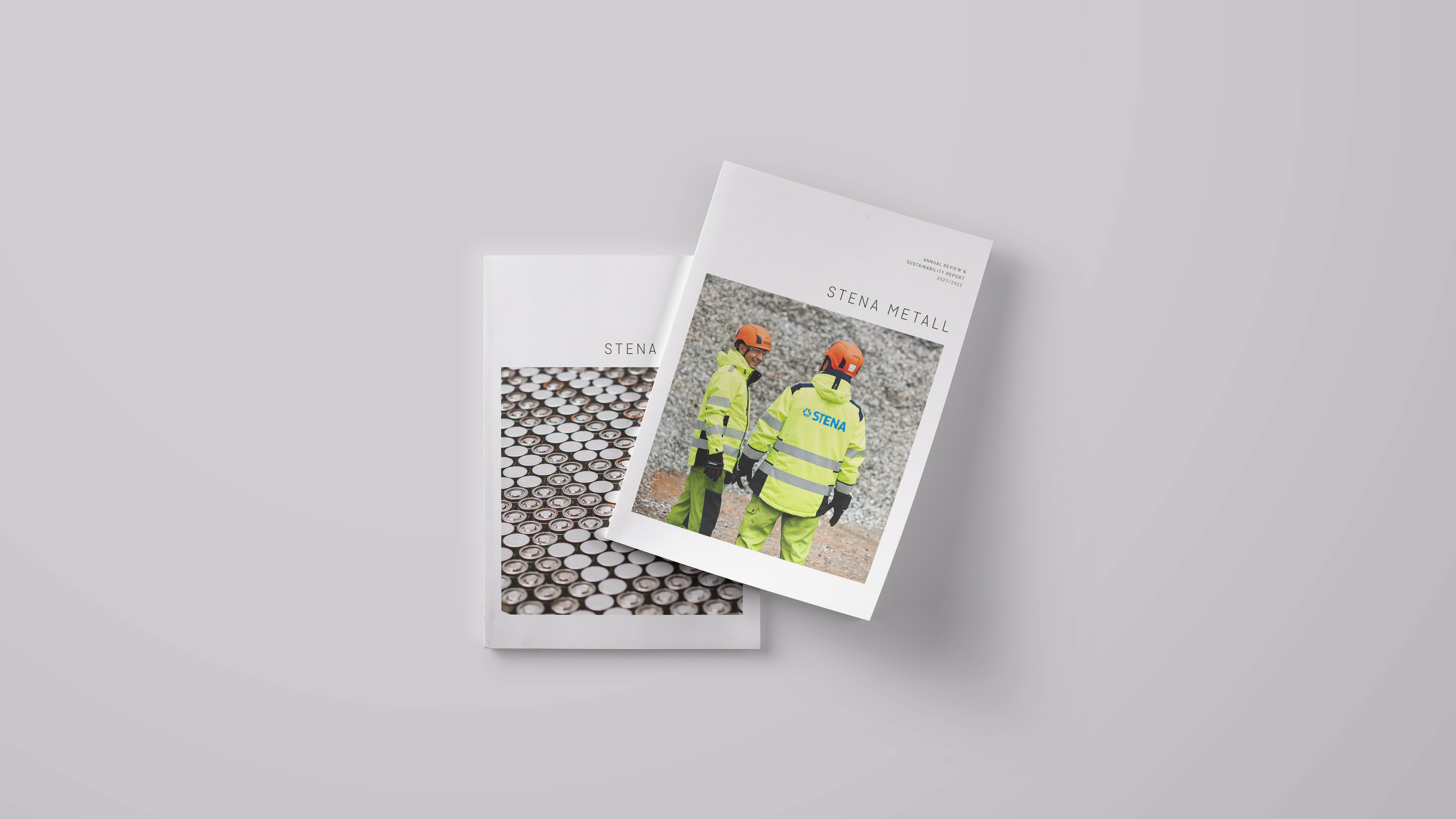 The covers of Stena Metall's Annual Report and an Annual Review & Sustainability Report 2021-2022